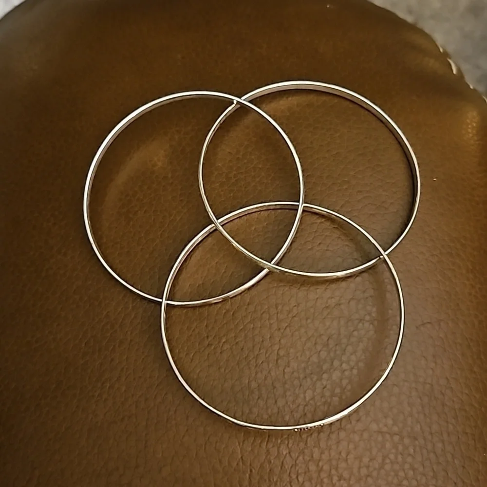 GUESS Dainty Interlocking Silvertone Bangle Bracelet